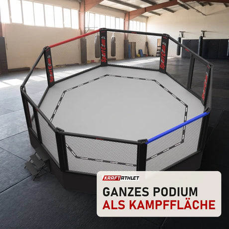 SportCom MMA-Wettkampfkäfig 9 m ohne Laufsteg in einer hellen Kampfsporthalle