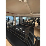 SportCom Pro-Trainingsboxring mit 30 cm Podium, mit Club-Logo auf dem Boden, Blick von oben