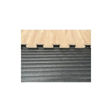 SportCom Puzzlematten 2 cm Schwarz/Holz, Nahaufnahme der Kante mit Holzoptik und Rillenstruktur