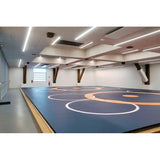 SportCom Ringerkreis-Aufdruck für Dollamur Flexi-Roll-Matten: Mattenfläche mit mehreren Kreisen, Seitenblick in die Halle