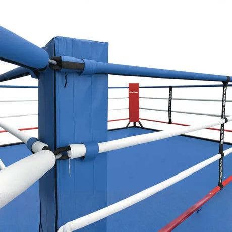 SportCom Wettkampf-Boxringseil mit Hülle, Ringecke mit blauem Eckpolster und weißen Seilhüllen