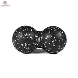 tiguar Duo Ball 16/8 cm Faszienball hart in Seitenansicht: schwarzer Doppelball mit weißen Sprenkeln