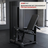 Titanium Strength Black Series Leg Extension in einem fertig eingerichteten Studio mit dunklen Wänden und Gummiboden