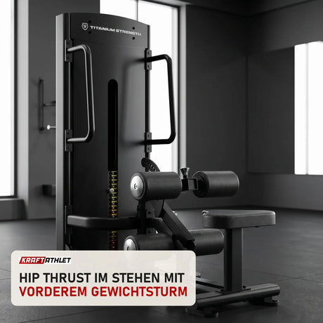 Titanium Strength Black Series Selectorisierte Ultimate Hip Thrust in einem fertig eingerichteten Studio mit dunklen Wänden und Gummiboden