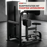 Titanium Strength Black Series Torso Rotation in einem fertig eingerichteten Studio mit dunklen Wänden und Gummiboden