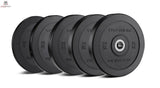 Titanium Strength BP15 HD Bumper Plate 15 kg schwarz: mehrere Scheiben hintereinander aufgereiht, Seitenansicht auf weißem Hintergrund