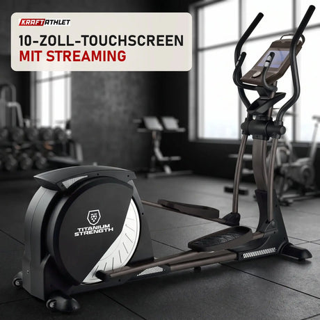 Titanium Strength CT900 TFT Crosstrainer Performance Series in einem fertig eingerichteten Studio mit dunklen Wänden und Gummiboden