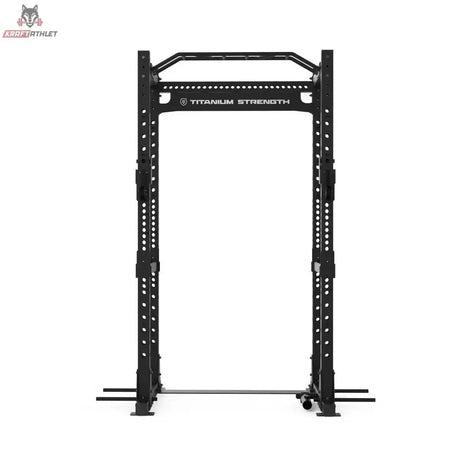 Titanium Strength Elite Series Power Cage E30 in Frontansicht mit Logo-Querstrebe und Bodenrahmen