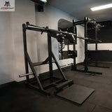 Titanium Strength Elite Series Viking Press und Stehender Wadenheber im Studio auf Gummiboden, Schrägansicht mit Bodenplatte