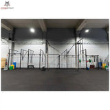 Titanium Strength Functional Wall RIG T1 als lange Wandanlage in einer großen Trainingshalle, Gesamtansicht