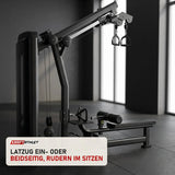 Titanium Strength Genesis Series Unilaterales Lat Pulldown und Rudern in einem fertig eingerichteten Studio mit dunklen Wänden und Gummiboden