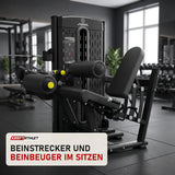 Titanium Strength M1 Selectorized Dualtrainer Quadrizeps und Oberschenkel in einem fertig eingerichteten Studio mit dunklen Wänden und Gummiboden