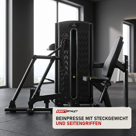 Titanium Strength M4 Sitzende Beinpresse in einem fertig eingerichteten Studio mit dunklen Wänden und Gummiboden