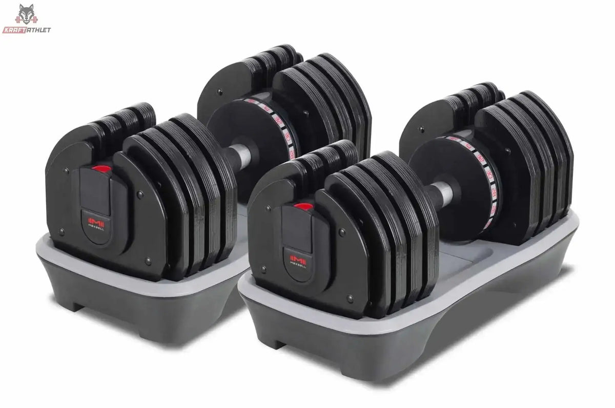 Titanium Strength MA36 verstellbare Kurzhanteln 2–36 kg mit Halterung als Hantelpaar in Schrägansicht in den grauen Ablageschalen