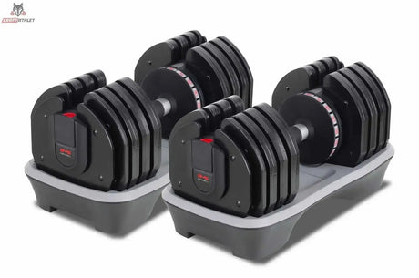 Titanium Strength MA36 verstellbare Kurzhanteln 2–36 kg mit Halterung als Hantelpaar in Schrägansicht in den grauen Ablageschalen