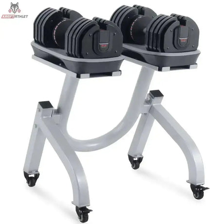 Titanium Strength MA36 verstellbare Kurzhanteln 2–36 kg mit Halterung auf dem grauen Ständer mit Rollen, beide Hanteln in den Ablageschalen
