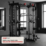 Titanium Strength R200 All-in-One Trainer in einem fertig eingerichteten Studio mit dunklen Wänden und Gummiboden