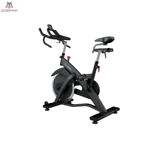 Titanium Strength SP2 Indoor Bike Pro Series – Schrägansicht von hinten mit Schwungradabdeckung