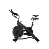 Titanium Strength SP2 Indoor Bike Pro Series – Seitenansicht von links mit Sattel, Lenker und Schwungrad