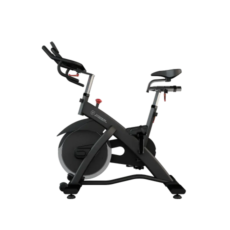 Titanium Strength SP2 Indoor Bike Pro Series – Seitenansicht von links mit Sattel, Lenker und Schwungrad
