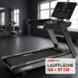 Titanium Strength TM1150 LED Laufband Pro Series in einem fertig eingerichteten Studio mit dunklen Wänden und Gummiboden