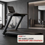 Titanium Strength TM700 Laufband Pro Series in einem fertig eingerichteten Studio mit dunklen Wänden und Gummiboden