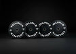 Younix Premium Bumper Plate 20 kg Hantelscheibe, Variante 5 kg, vier Scheiben stehend im dunklen Studio